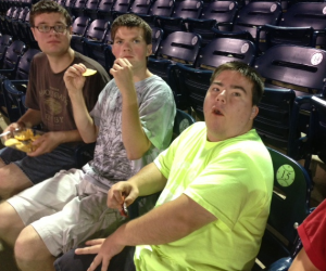 Chris, Jimmy and Alex enjoy the Riverhawks game and some nachos!
